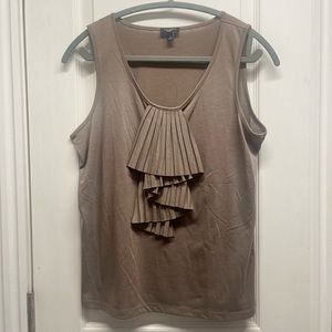 Brown accordion style tank